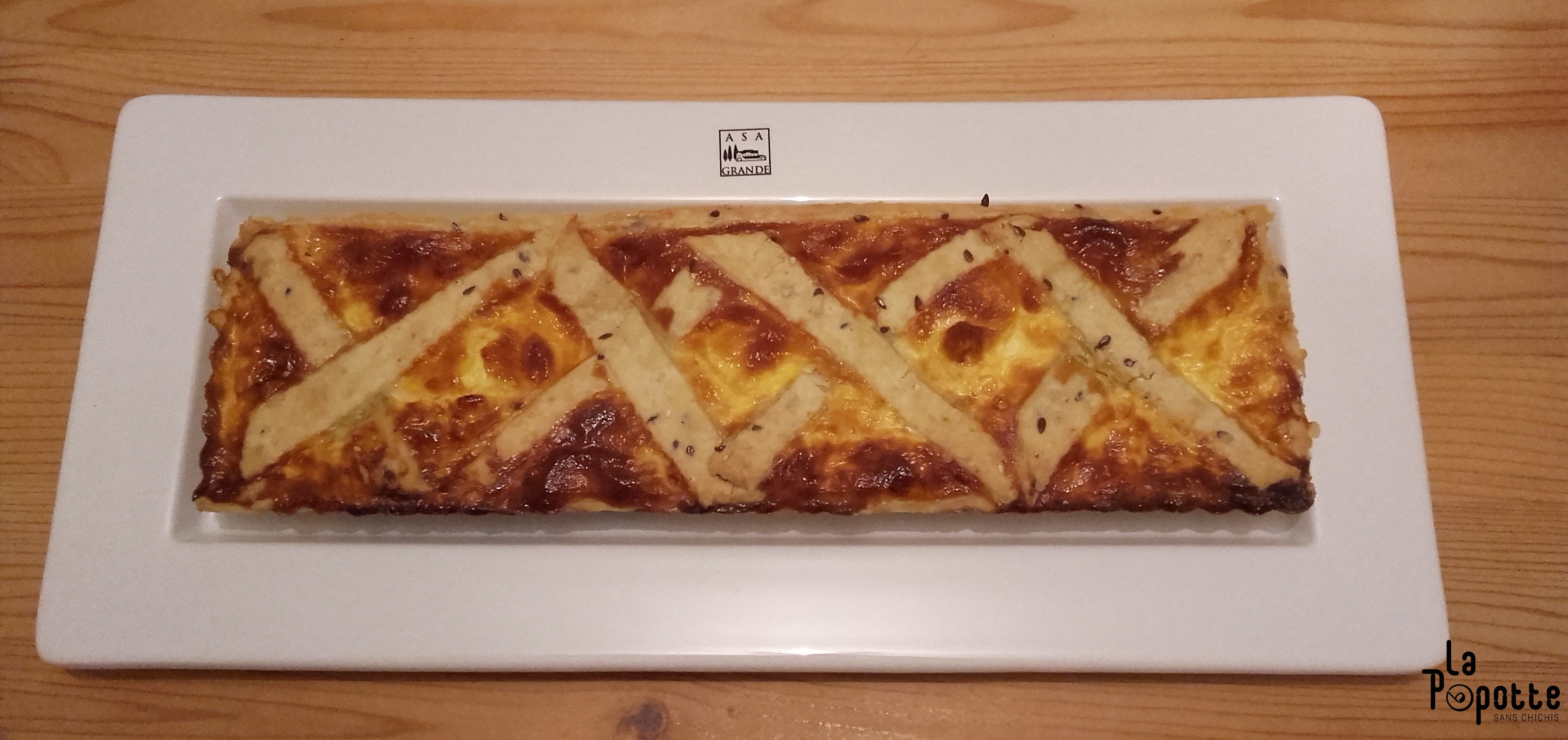 Tarte reblochon, lardons et oignon